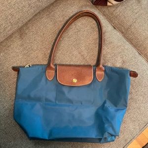 Like new - only used once Longchamp purse!